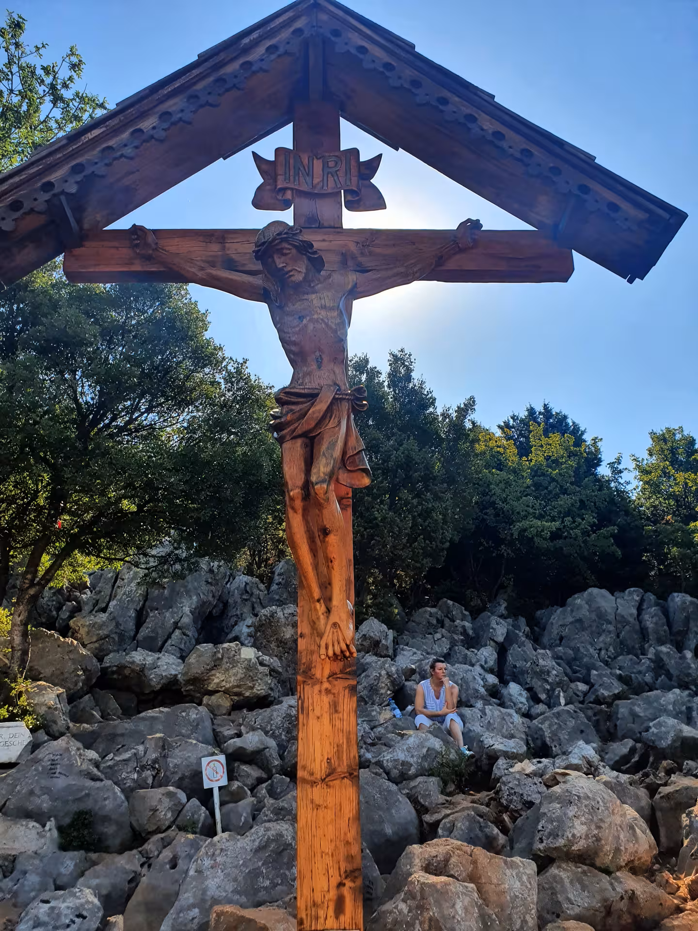 Wooden crucifix on rocky Cross Mountain in Medjugorje, pilgrimage highlight on exclusive Split day trip
