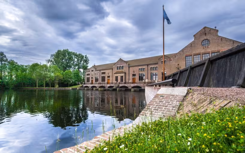 Wouda Pumping Station by the water, UNESCO World Heritage highlight on a private day tour from Amsterdam