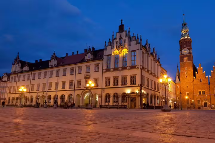 Wroclaw Market Square at night with Town Hall lights, featured on the self-guided scavenger hunt tour