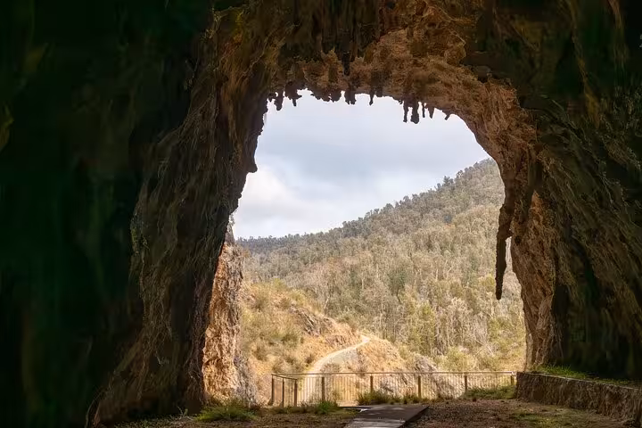 View from Yarrangobilly Caves entrance, showcasing stunning landscape of Snowy Mountains NSW, ideal for exploration on tour.