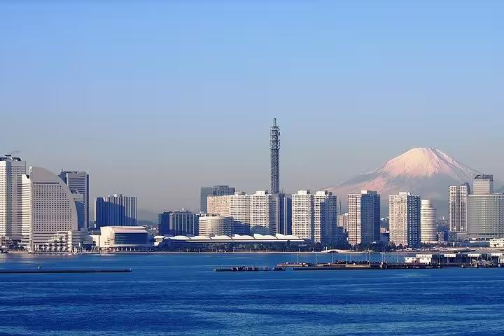 Panoramic skyline of Yokohama with Mt. Fuji in the background, highlighting the beauty of Japan's iconic landmarks.