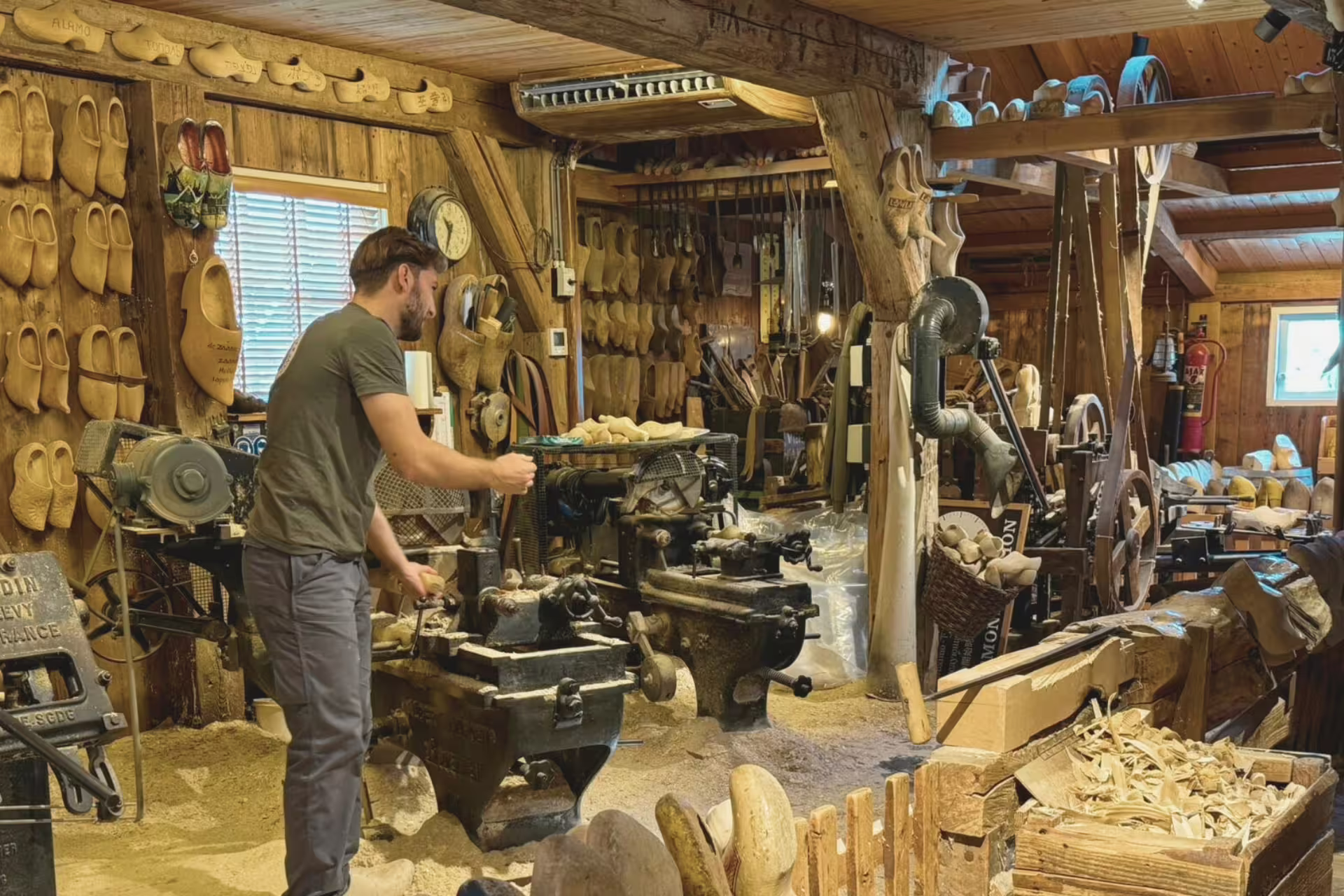 Zaanse Schans clog workshop with traditional wooden shoe making demo on Amsterdam countryside tour