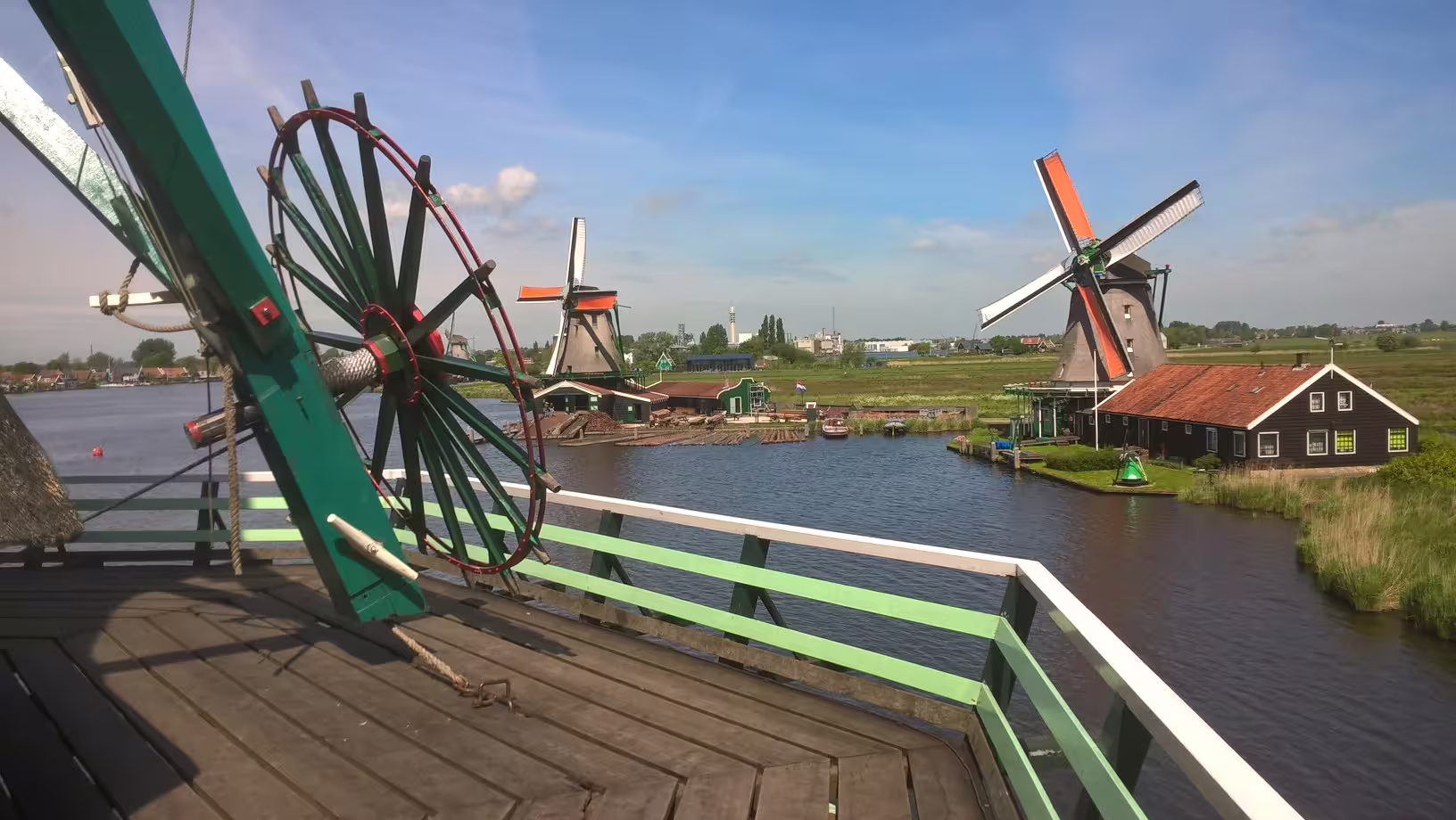 View from a Zaanse Schans windmill over canal and historic houses, private Zaanse Schans tour from Amsterdam