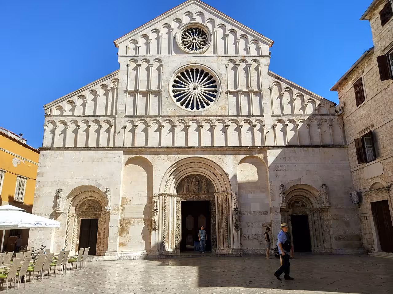 Romanesque facade of Zadar Cathedral with rose window, key ancient church on Nin & Zadar history tour