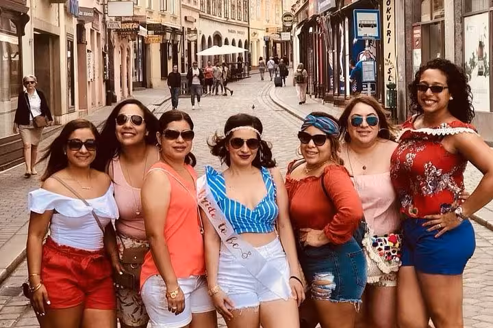 Friends posing on Tkalčićeva Street in Zagreb Old Town, lively stop on the Zagreb BIG Tour city exploration