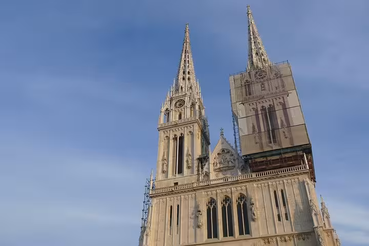 Zagreb Cathedral twin spires on a private day tour from Vienna to Zagreb, Croatia, under blue sky