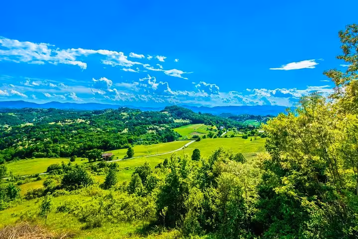 Scenic Croatian countryside near Zagreb on fairytale castle tour, rolling green hills and panoramic views
