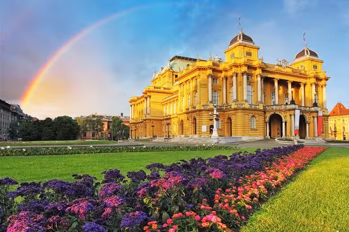 Zagreb Croatian National Theatre at sunset with rainbow, finale of Dubrovnik Mostar Split tour