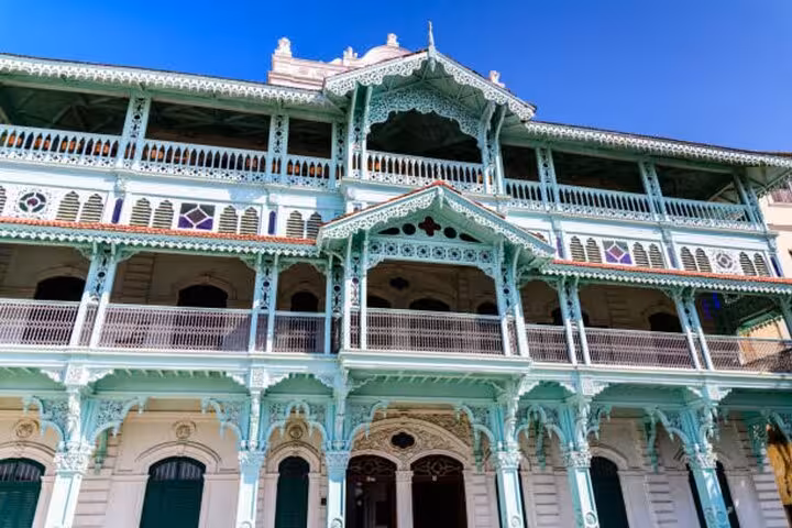 Discover the intricate architecture of the Old Dispensary in Zanzibar's Stone Town on a guided walking tour.