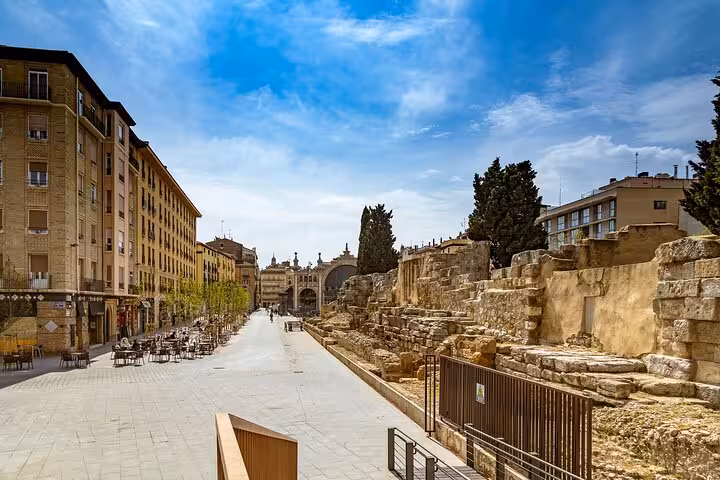 Discover ancient Roman ruins alongside modern architecture on a Zaragoza city walk with a local guide.