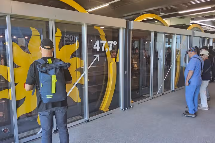 Passengers board the 47.7° Stoos funicular, world’s steepest ride on a Zurich day trip to Mount Rigi
