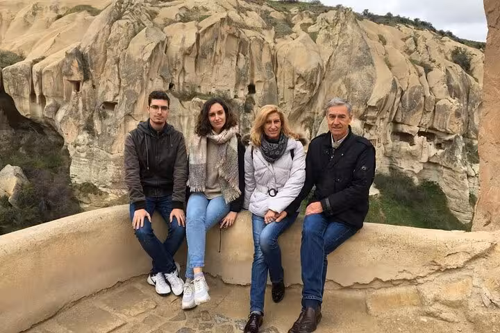 Cappadocia rock valley viewpoint with travelers on Spanish tour, 6-day Istanbul Cappadocia package with flights