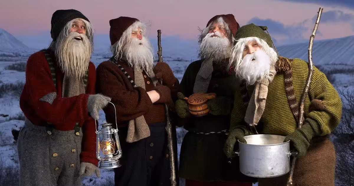 Group of festive characters in Nordic attire enjoying a winter evening on the Viking Women adventure tour.