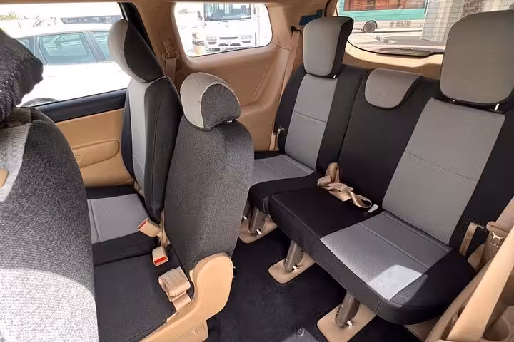 Spacious 7-seater private car interior for Dubai city rides and Dubai to Abu Dhabi airport transfer