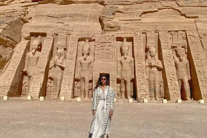 Traveler at Abu Simbel Small Temple of Nefertari on full-day guided tour from Aswan, Egypt