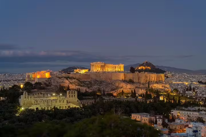Illuminated Acropolis and Parthenon at dusk, highlight of a half-day private Athens city tour with skip-the-line entry