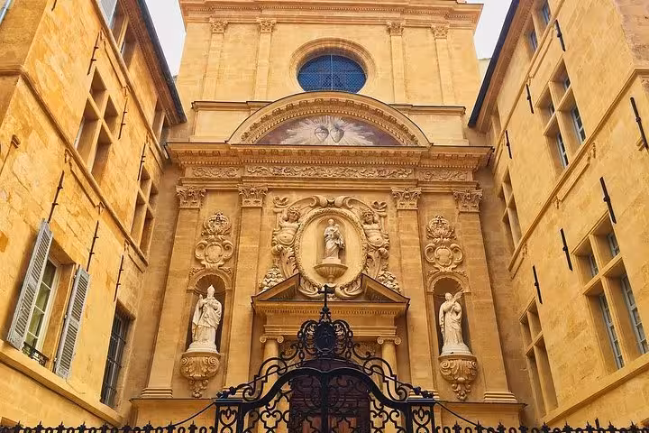 Historic Aix-en-Provence church facade, cultural highlight on Cézanne and the winegrowers wine tour