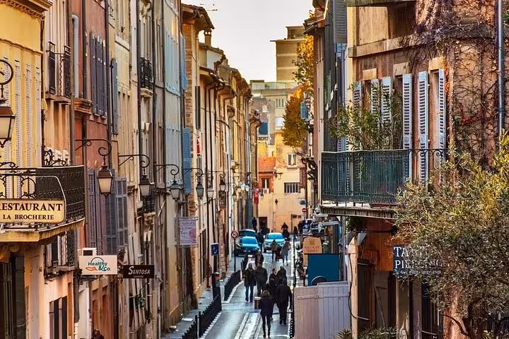 Old Town Aix-en-Provence street at golden hour, strolling before Cézanne and the winegrowers wine tasting tour