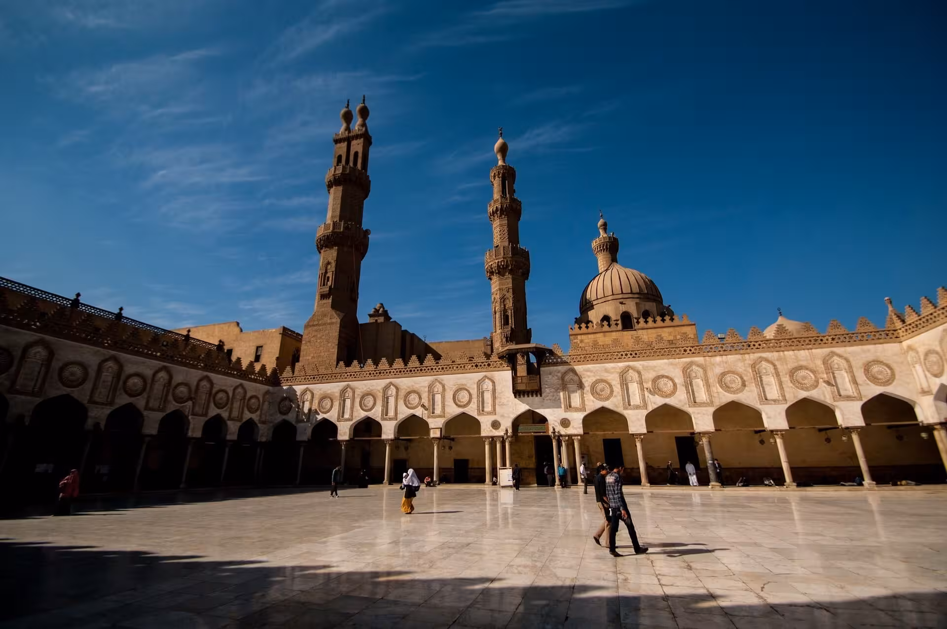 Al-Azhar Mosque courtyard with minarets in Old Cairo, highlight of full-day Islamic and Coptic Cairo tour