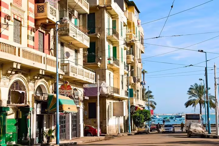 Alexandria Corniche street with historic balconies and sea view, included in 6-day Egypt tours package