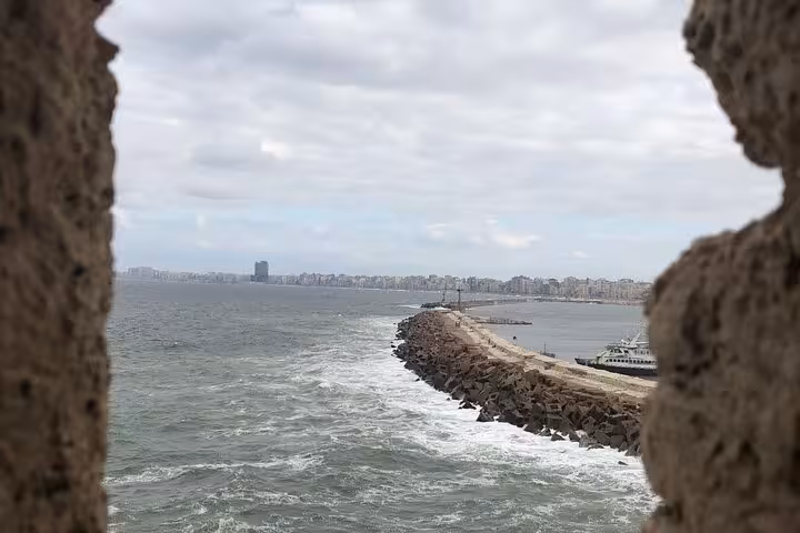 View of Alexandria harbor breakwater from Qaitbay Citadel on Cairo private day tour with guide and tickets