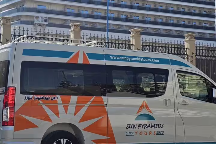 Air-conditioned tour van pickup at Alexandria Port for National Museum, Citadel of Qaitbay and bazaar tour