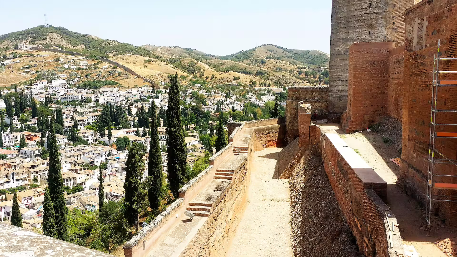 Alhambra fortress walls with panoramic Granada and Albaicín views on a private tour with hotel pick-up