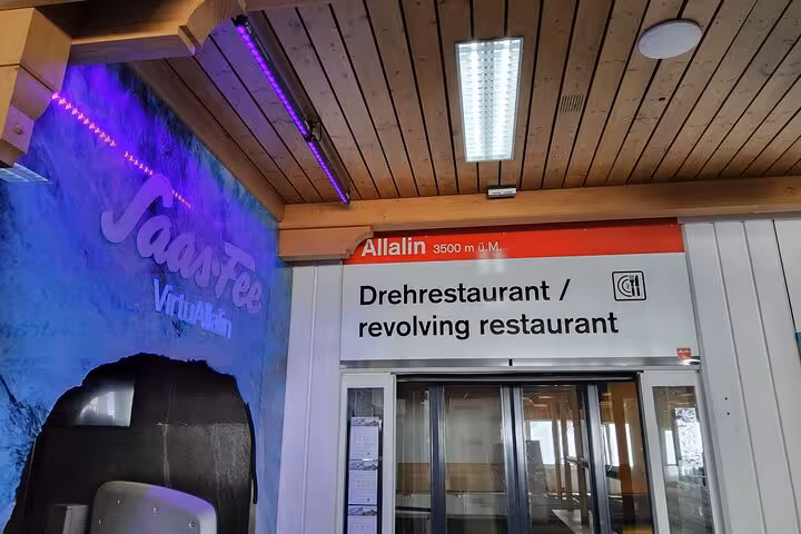 Allalin 3500m revolving restaurant entrance at Saas-Fee, a stop on the 4-day Swiss Alps tour