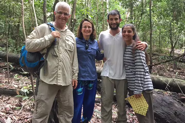 Group of tourists exploring the lush Amazon rainforest during the Amazon Jungle Experience at Mamori Lodge.