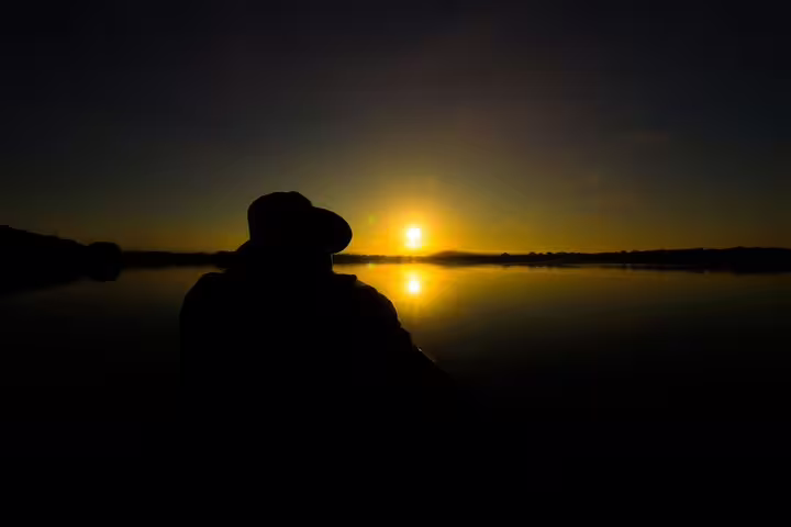Breathtaking Amazon sunset view over tranquil waters, experienced during Amazon Mamori Lodge adventure.