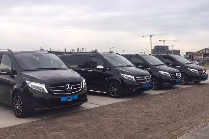 Fleet of black Mercedes vans for private transfer from Amsterdam or Schiphol Airport to Utrecht, Netherlands