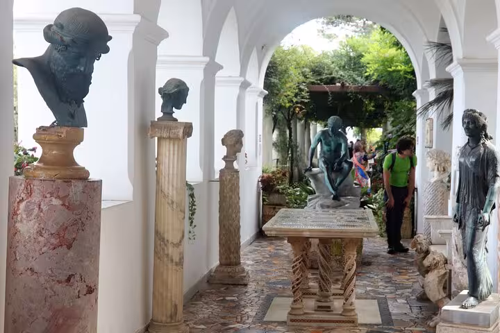 Explore the historical sculptures and elegant architecture in Anacapri during the Capri tour from Sorrento.