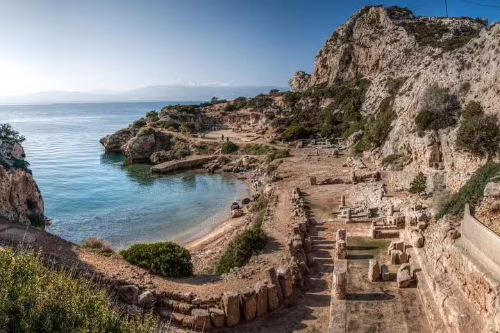 Coastal ruins near Ancient Corinth with sea views, included on a full-day private tour with lunch in Greece