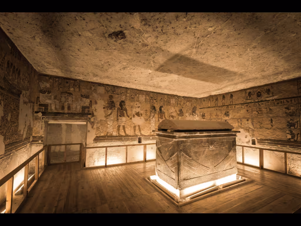 Ancient Egyptian tomb chamber with hieroglyphs and sarcophagus, featured on 11-day budget Egypt adventure tour