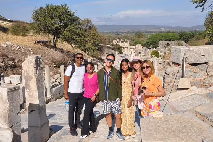 Group exploring ancient Ephesus ruins on private tour from Kusadasi Port, perfect for cruise passengers.