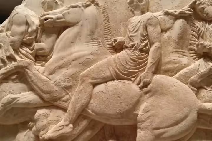 Close-up of ancient Greek horseman relief at the Acropolis Museum on Friday night tour in Athens
