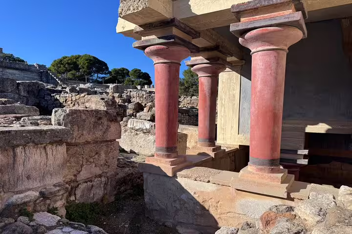 Ancient ruins with iconic red columns visited on a VIP Luxury Private LandRover 4x4 excursion.