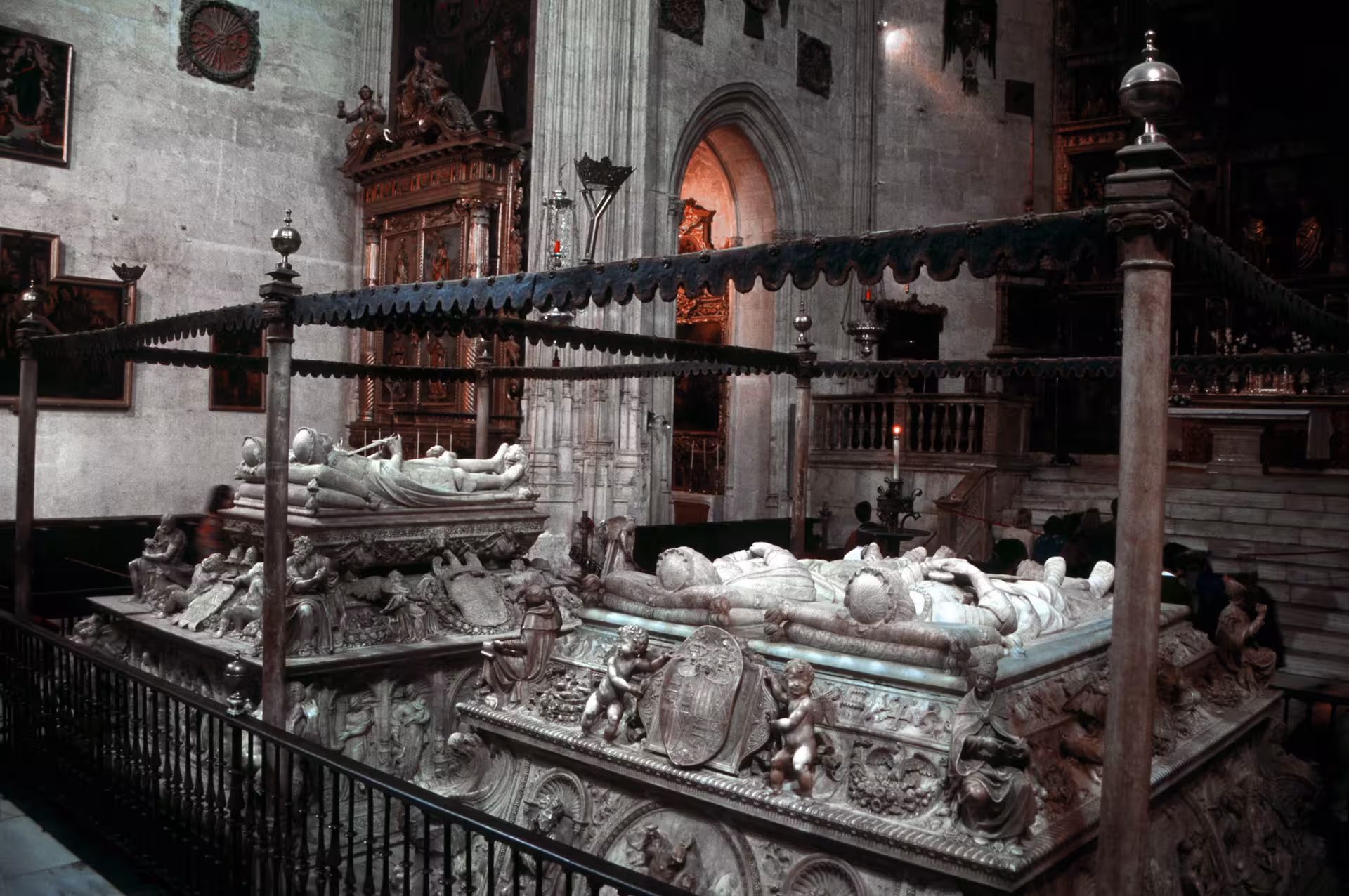 Intricate stone carvings and tombs inside historic Andalusian cathedral on 5-day guided tour from Madrid.