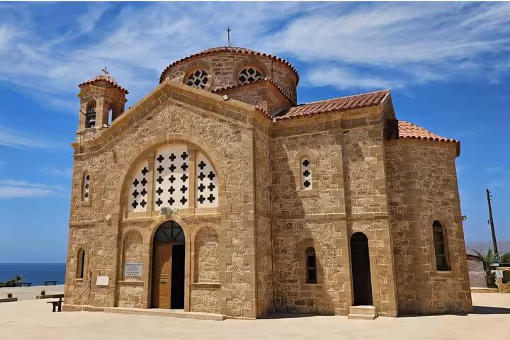 Historic stone seaside church stop on The Aphrodite Experience tour near Paphos, Cyprus sightseeing