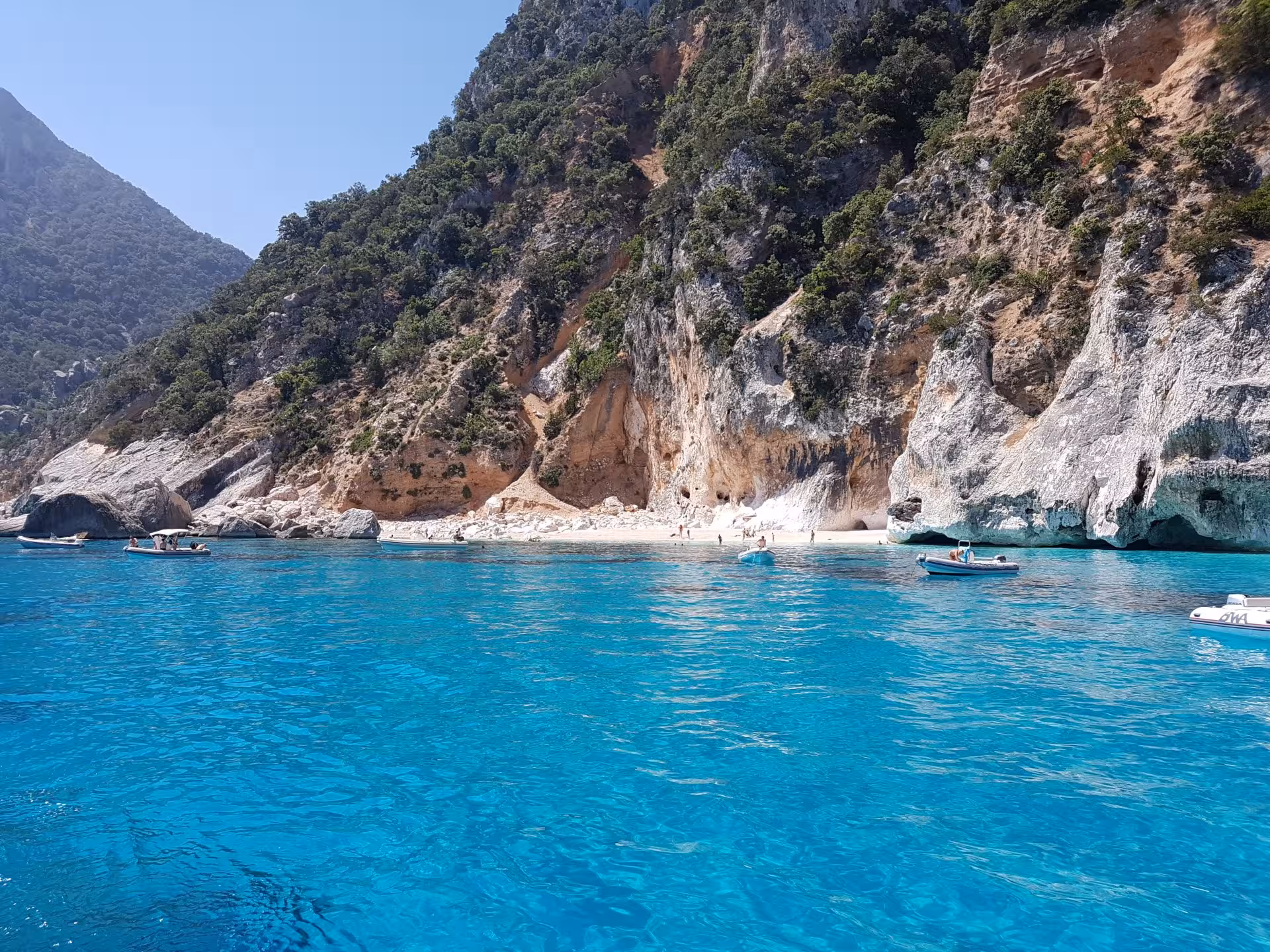 Crystal clear waters and rocky coastline at the Gulf of Orosei, perfect for a sailing adventure from Arbatax.