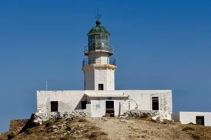 Armenistis Lighthouse on Mykonos with sea views, a highlight stop on a private classic island tour