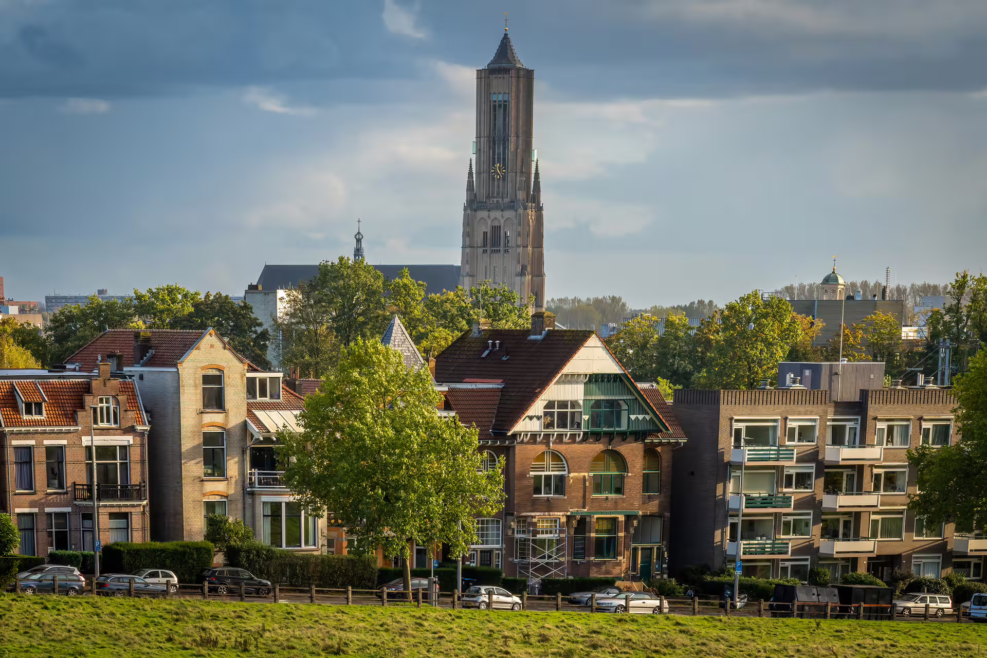 Arnhem skyline with Eusebius Church tower above riverside homes, ideal stop on a 1-day walking tour audioguide