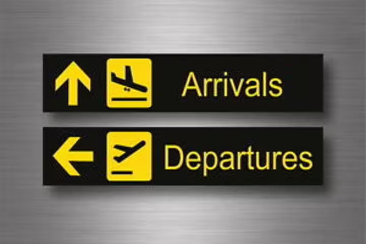 Aswan Airport arrivals and departures sign, meeting point for private transfer pickup and drop-off service