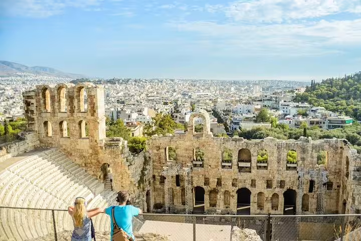 Athens private walking tour view over Odeon of Herodes Atticus near Acropolis, Plaka and food tastings