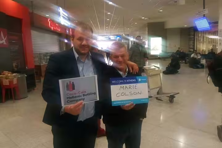 Athens airport meet and greet with driver holding name sign, luxury limousine service from Athens city to Acropolis