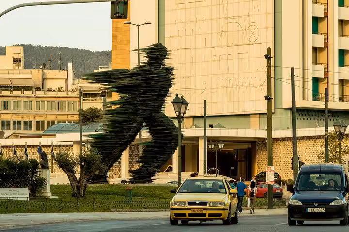Downtown Athens street scene near Hilton, perfect for private airport pickup and 1-hour city orientation tour
