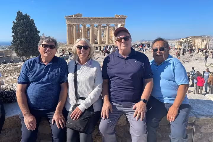Group of tourists enjoying the view of the Parthenon during Athens Highlights Shore Excursion Private Tour.