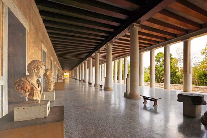 Explore ancient artifacts and architecture at the Stoa of Attalos on the Athens Highlights Shore Excursion tour.