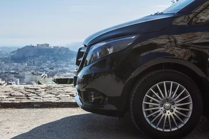 Private transfer van in Athens for direct ride from hotels to Piraeus cruise port, reliable departure transport