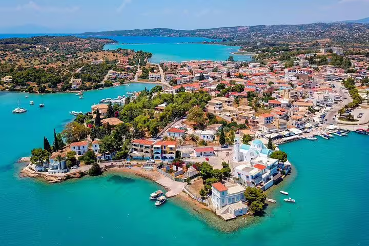 Coastal town and turquoise coves near Porto Heli, Greece, on a private transfer from Athens to Amanzoe resort